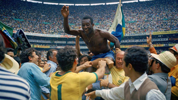 Pelé is lifted in celebration after Brazil’s 1970 World Cup triumph